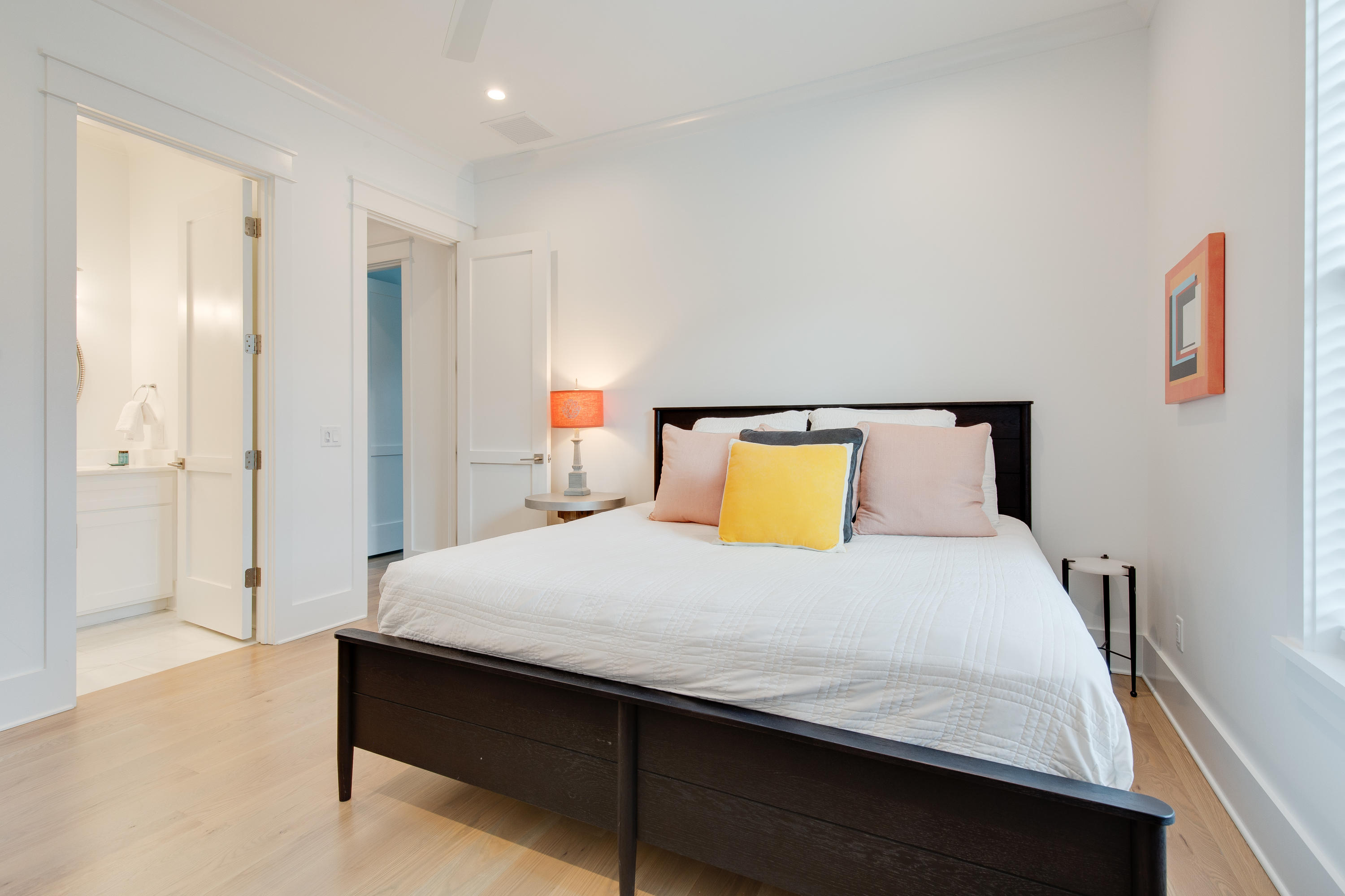 94 Pine Crest Circle Rosemary Beach, FL 32461 - Photo 38 of 69 a bedroom with a bed and a table