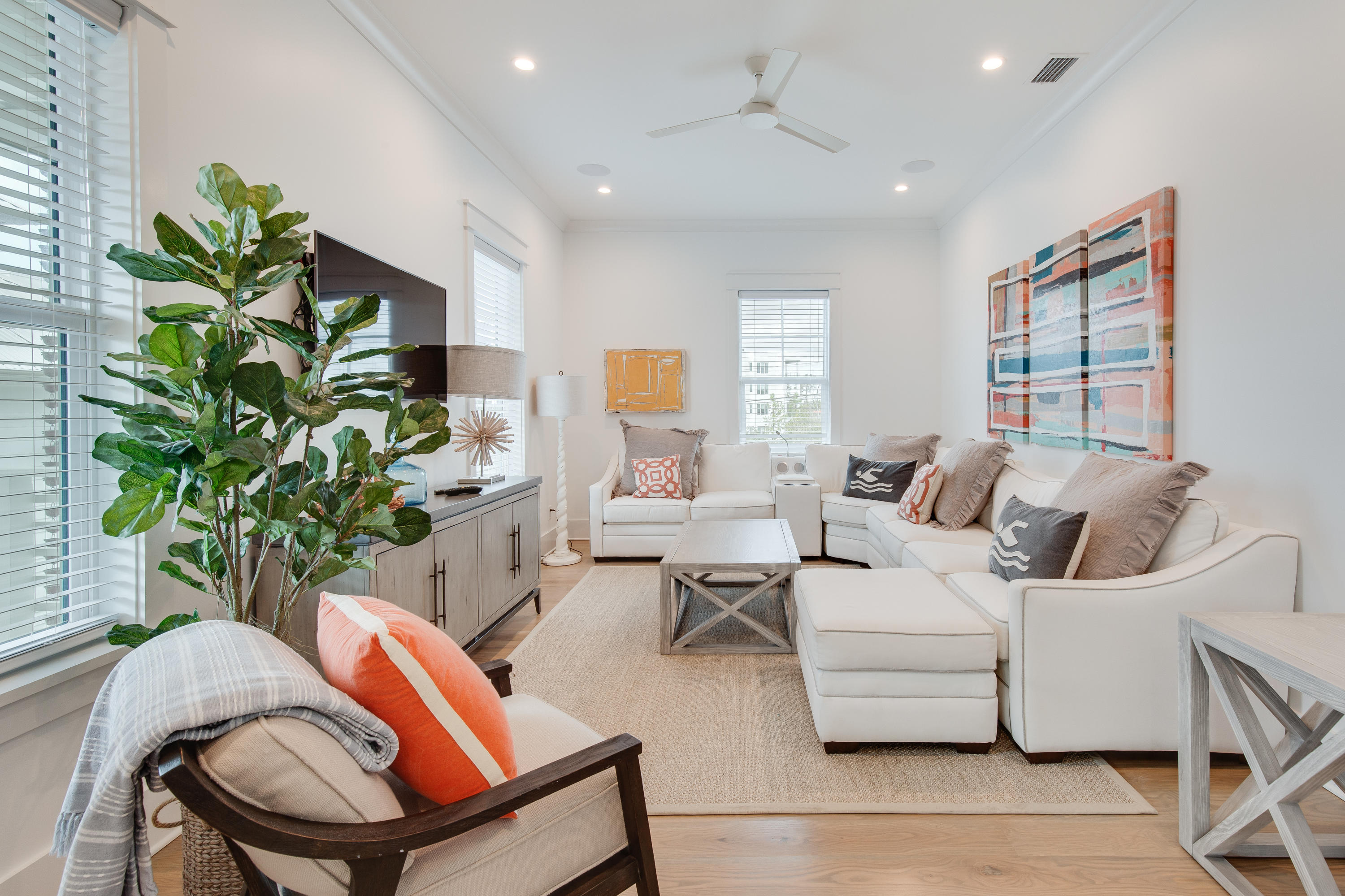 94 Pine Crest Circle Rosemary Beach, FL 32461 - Photo 39 of 69 a living room with furniture a potted plant and a wooden floor