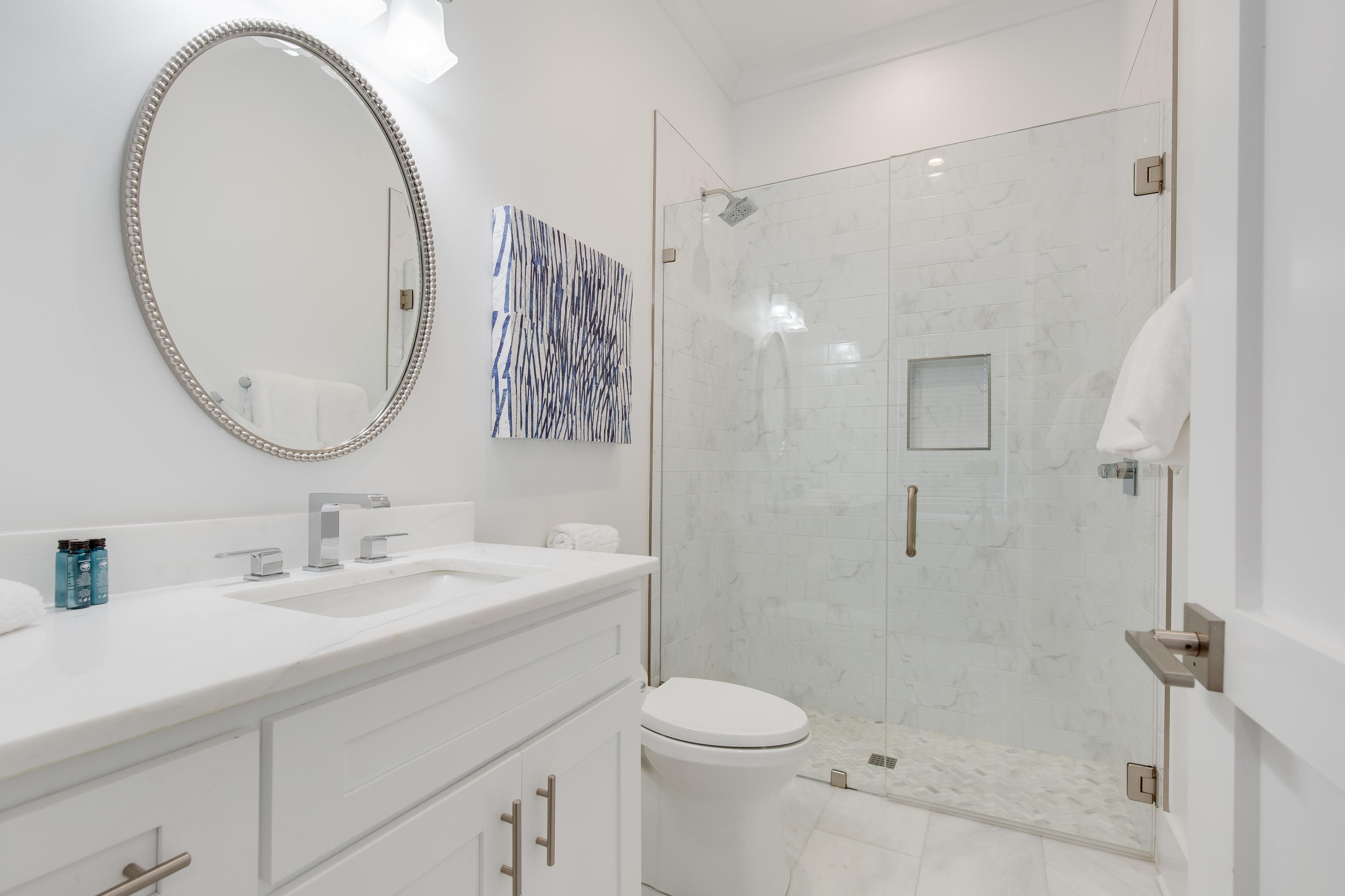 94 Pine Crest Circle Rosemary Beach, FL 32461 - Photo 42 of 69 a bathroom with a sink a toilet and a mirror
