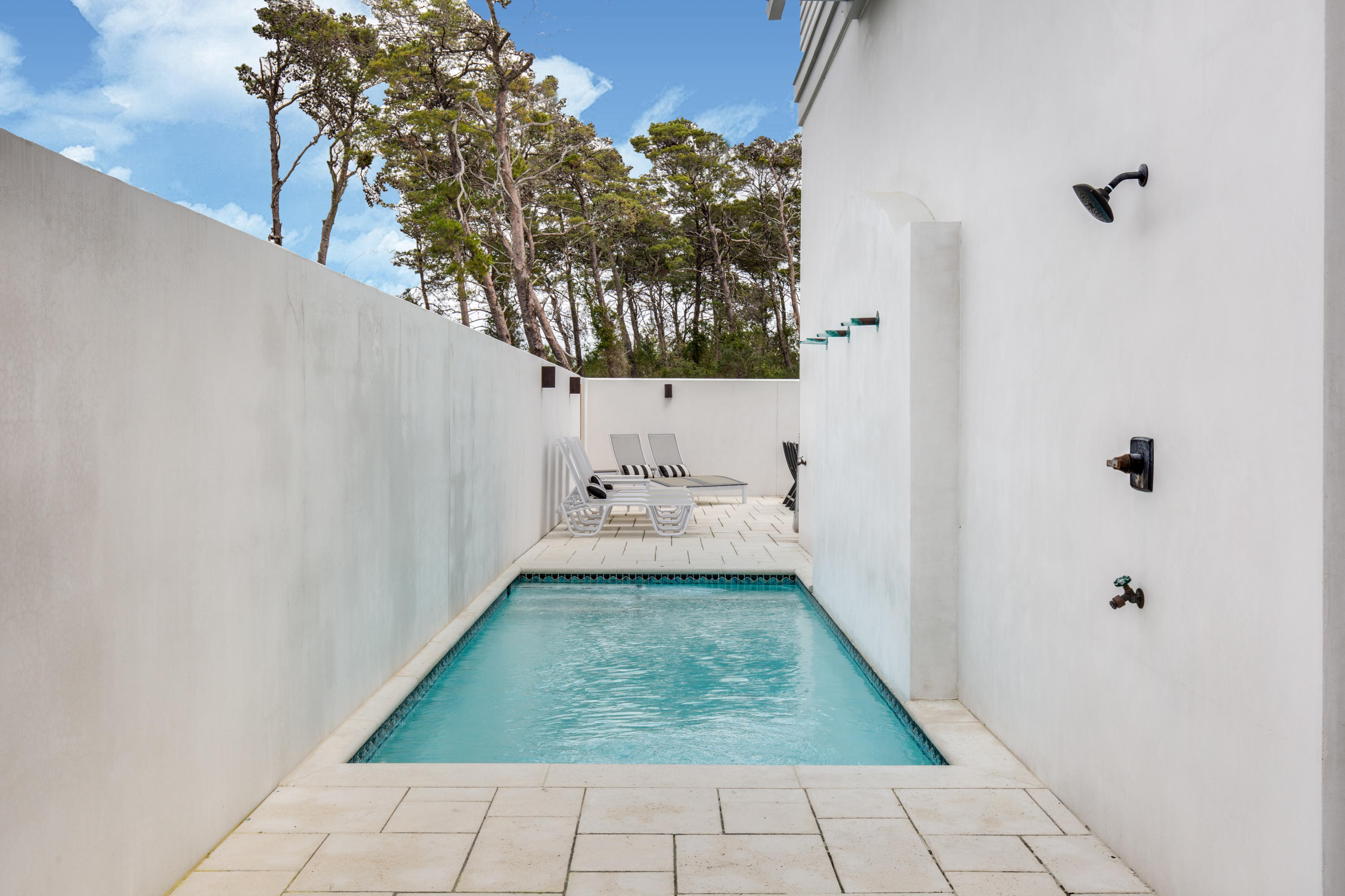 94 Pine Crest Circle Rosemary Beach, FL 32461 - Photo 6 of 69 a bathroom with a sink and mirror