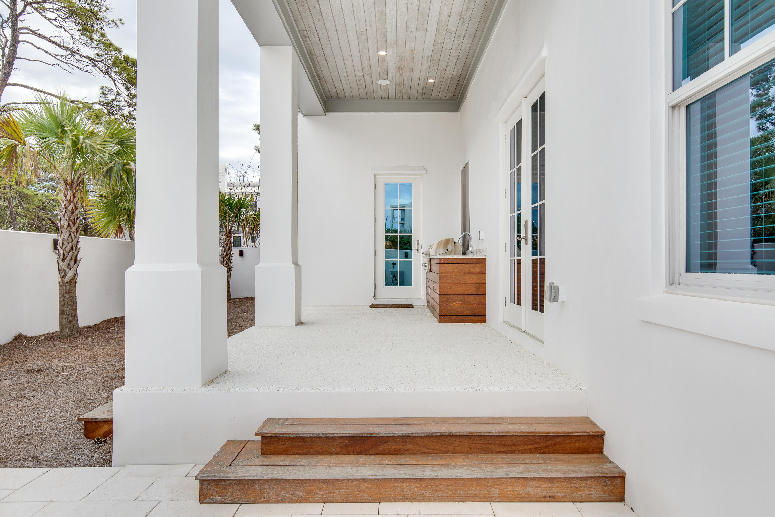 94 Pine Crest Circle Rosemary Beach, FL 32461 - Photo 53 of 69 a spacious en suite bathroom with a bathtub and potted plant