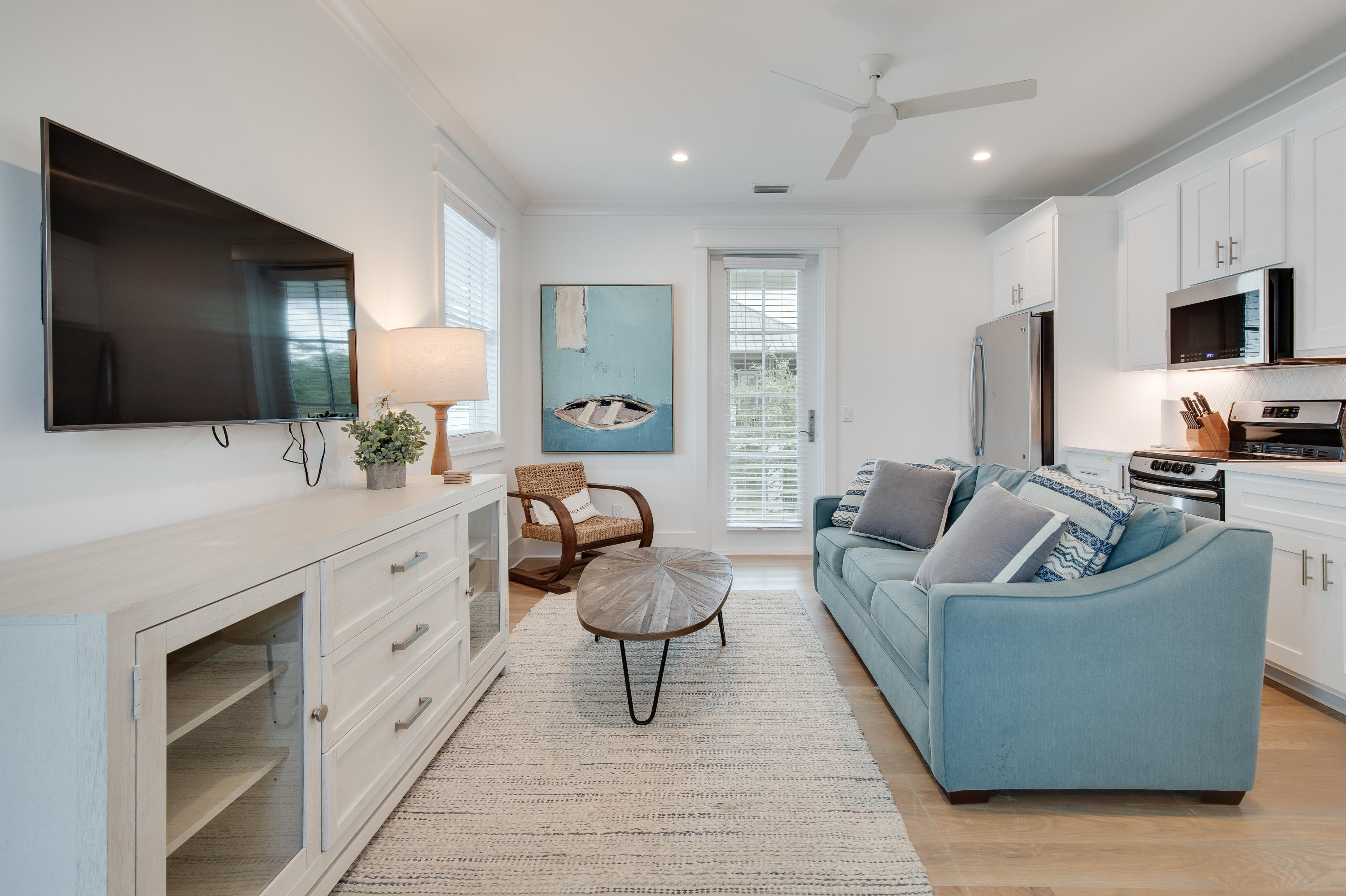 94 Pine Crest Circle Rosemary Beach, FL 32461 - Photo 64 of 69 a living room with furniture and a flat screen tv