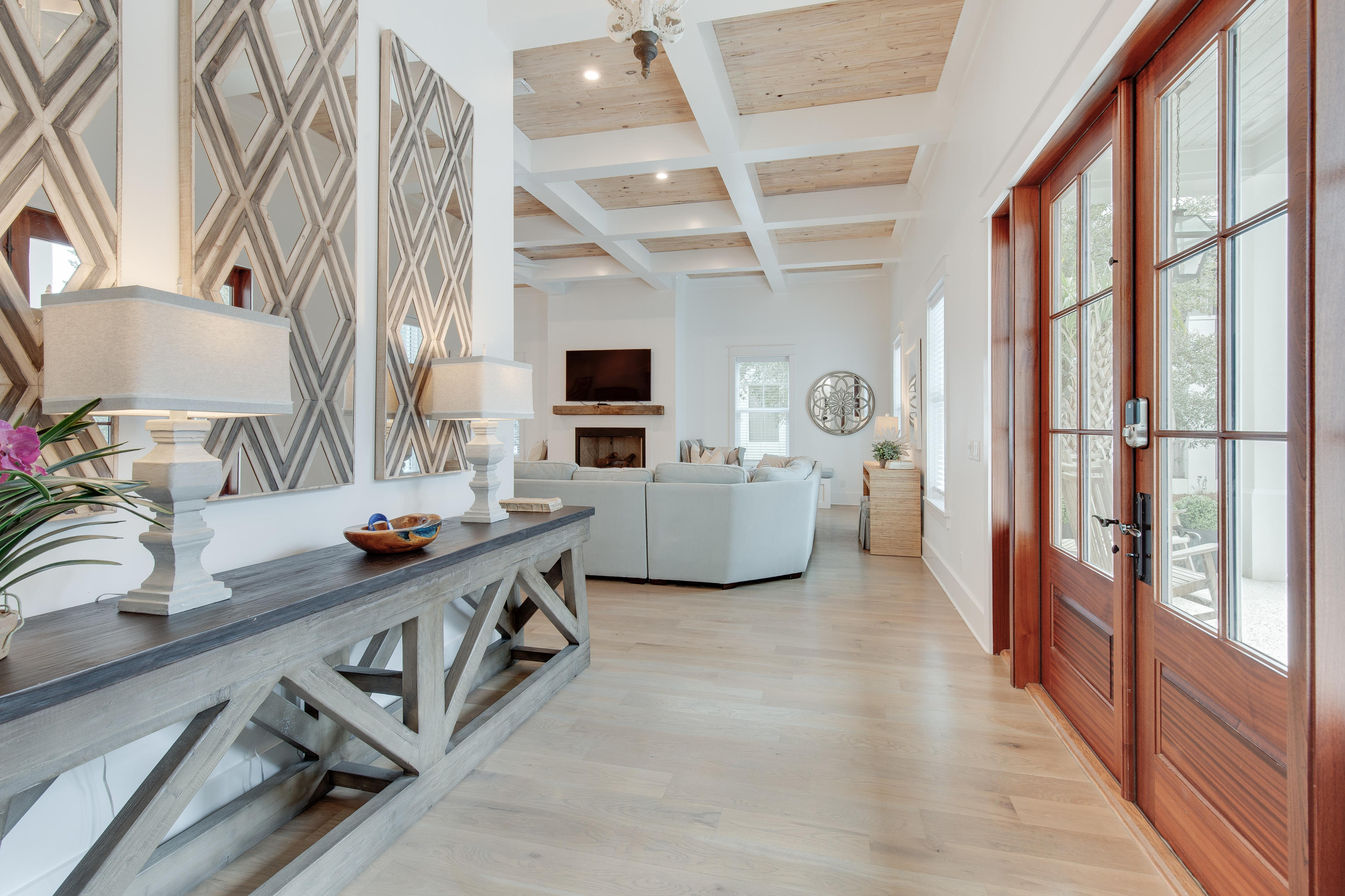 94 Pine Crest Circle Rosemary Beach, FL 32461 - Photo 8 of 69 a view of living room kitchen with furniture and flat screen tv