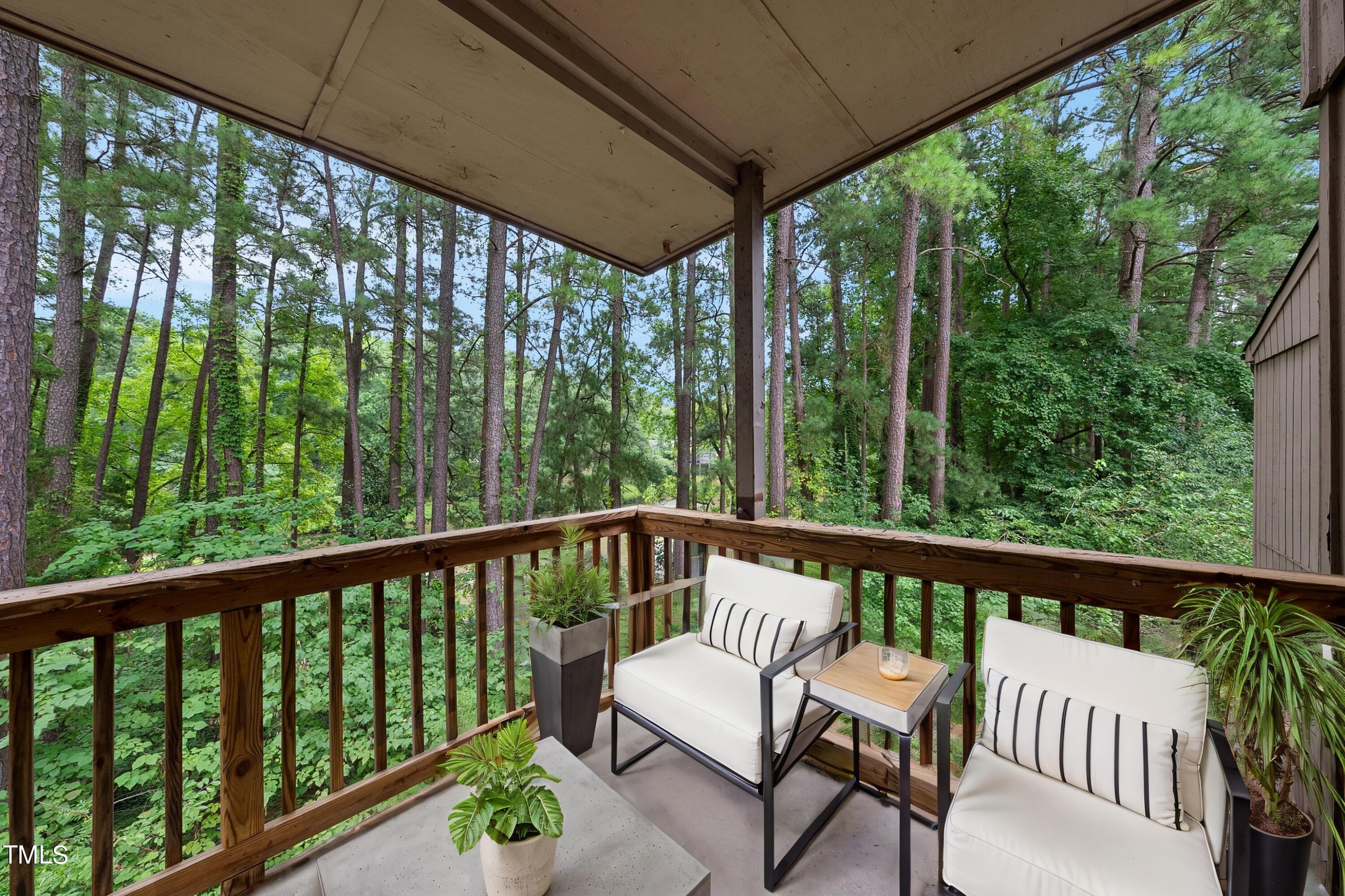 689 Pine Ridge Place Raleigh, NC 27609 - Photo 12 of 15 a view of a two chairs in the deck