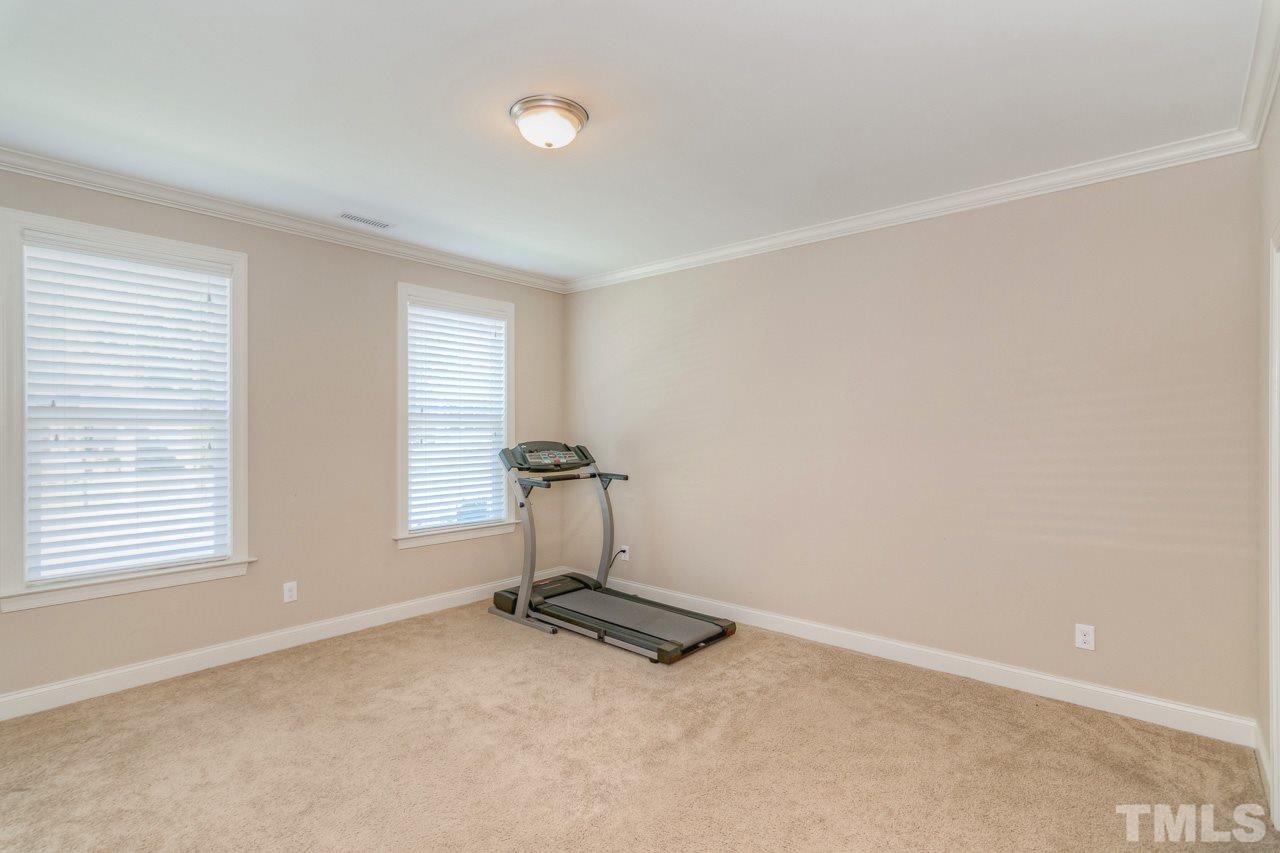 1141 Chapanoke Road Raleigh, NC 27603 - Photo 22 of 25 a room with a window