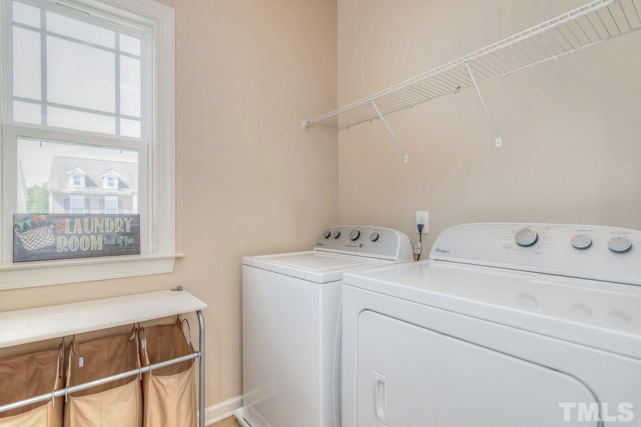 1141 Chapanoke Road Raleigh, NC 27603 - Photo 25 of 25 a utility room with dryer and washer