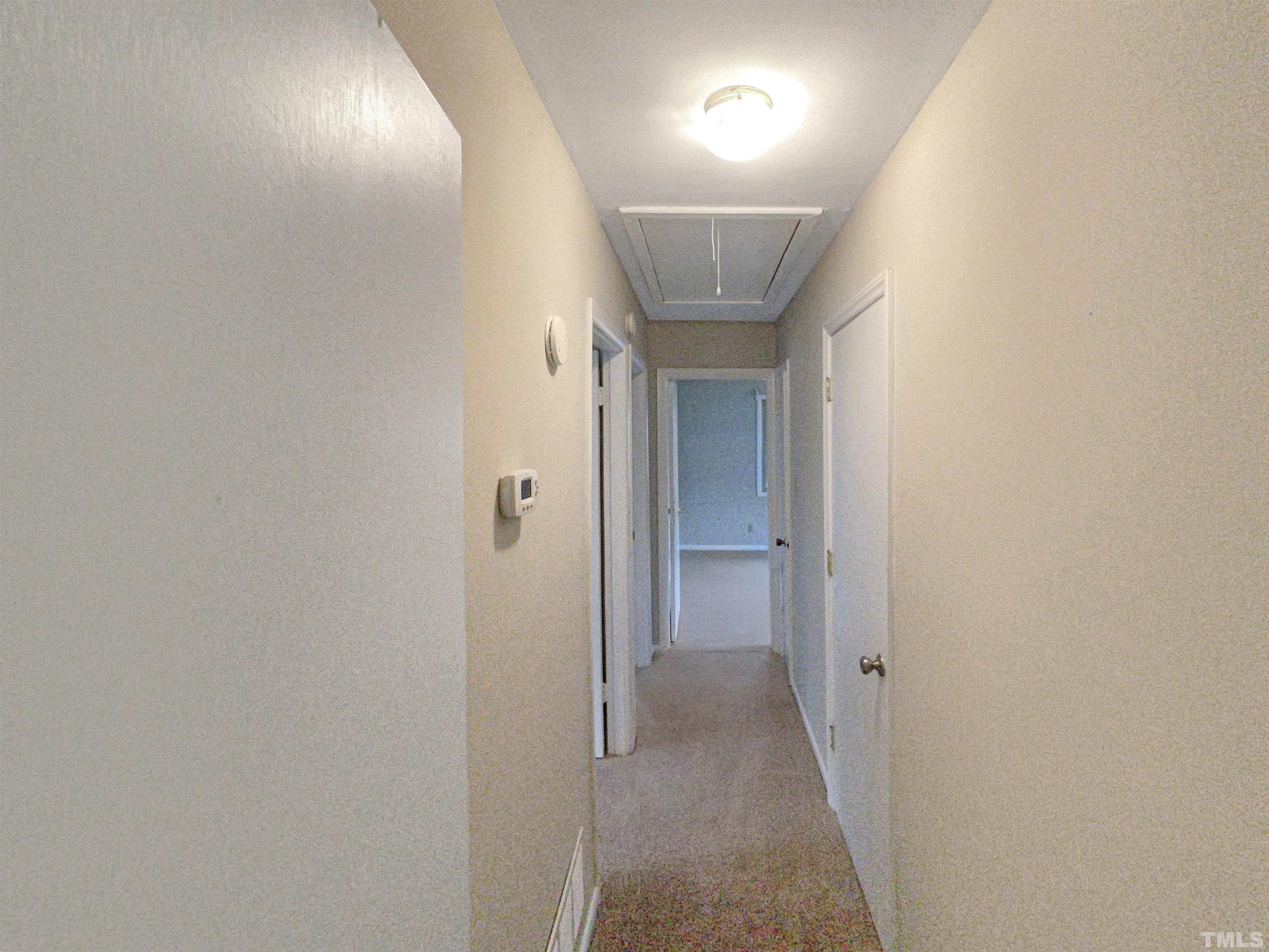 5333 Olive Road Raleigh, NC 27606 - Photo 11 of 18 a view of hallway with a hallway