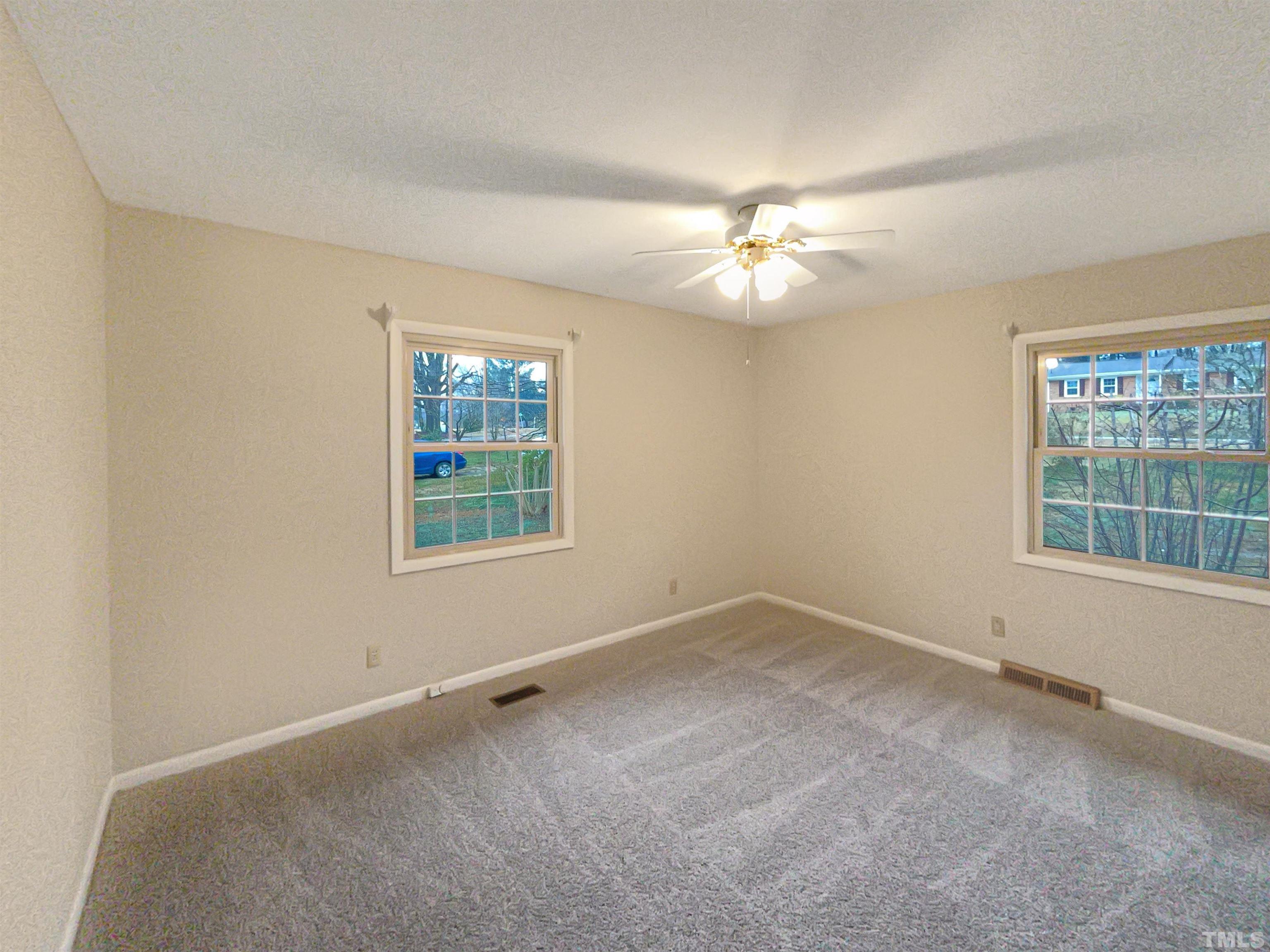 5333 Olive Road Raleigh, NC 27606 - Photo 15 of 18 a view of an empty room with a window