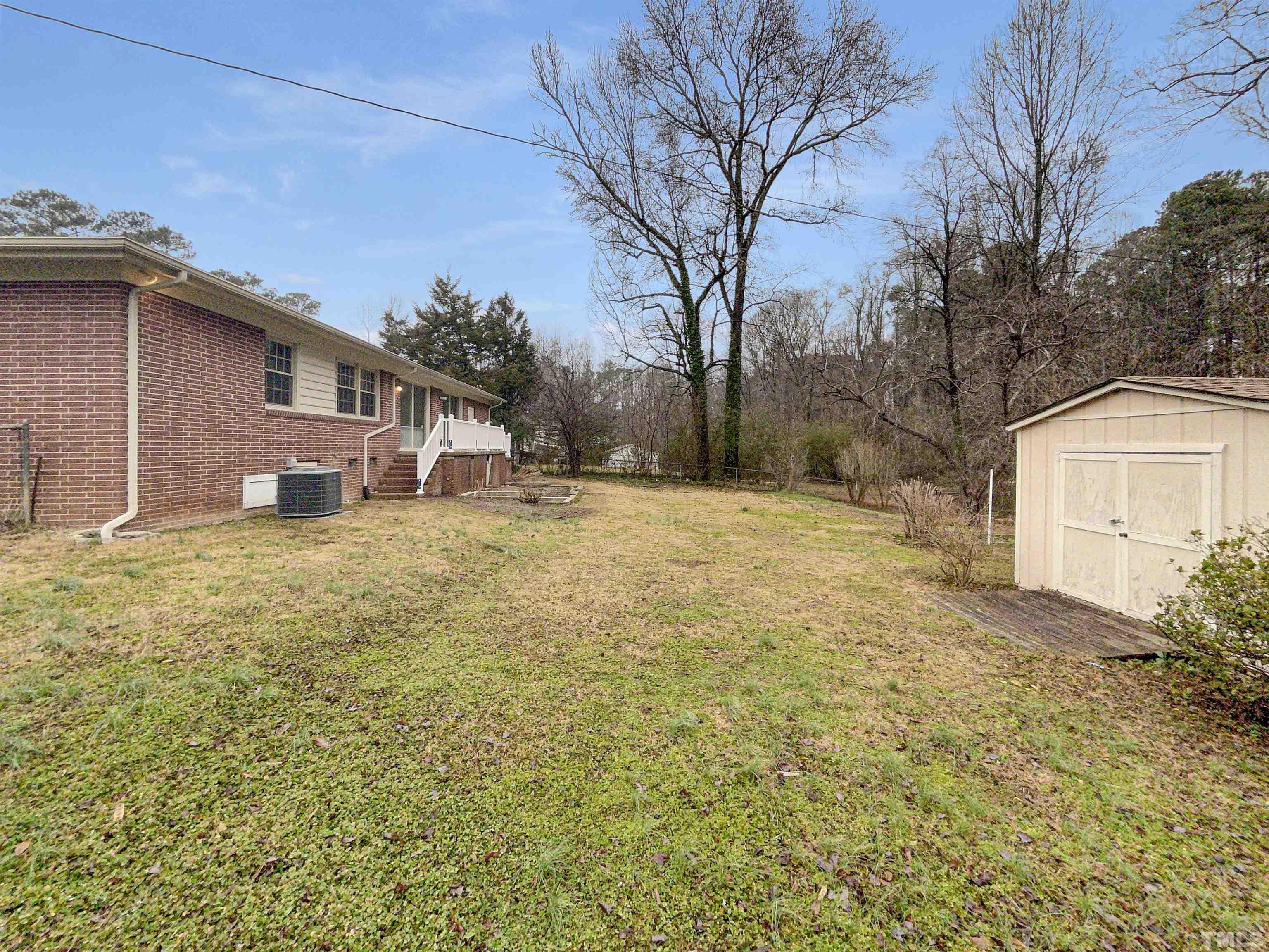 5333 Olive Road Raleigh, NC 27606 - Photo 5 of 18 a house view with a outdoor space