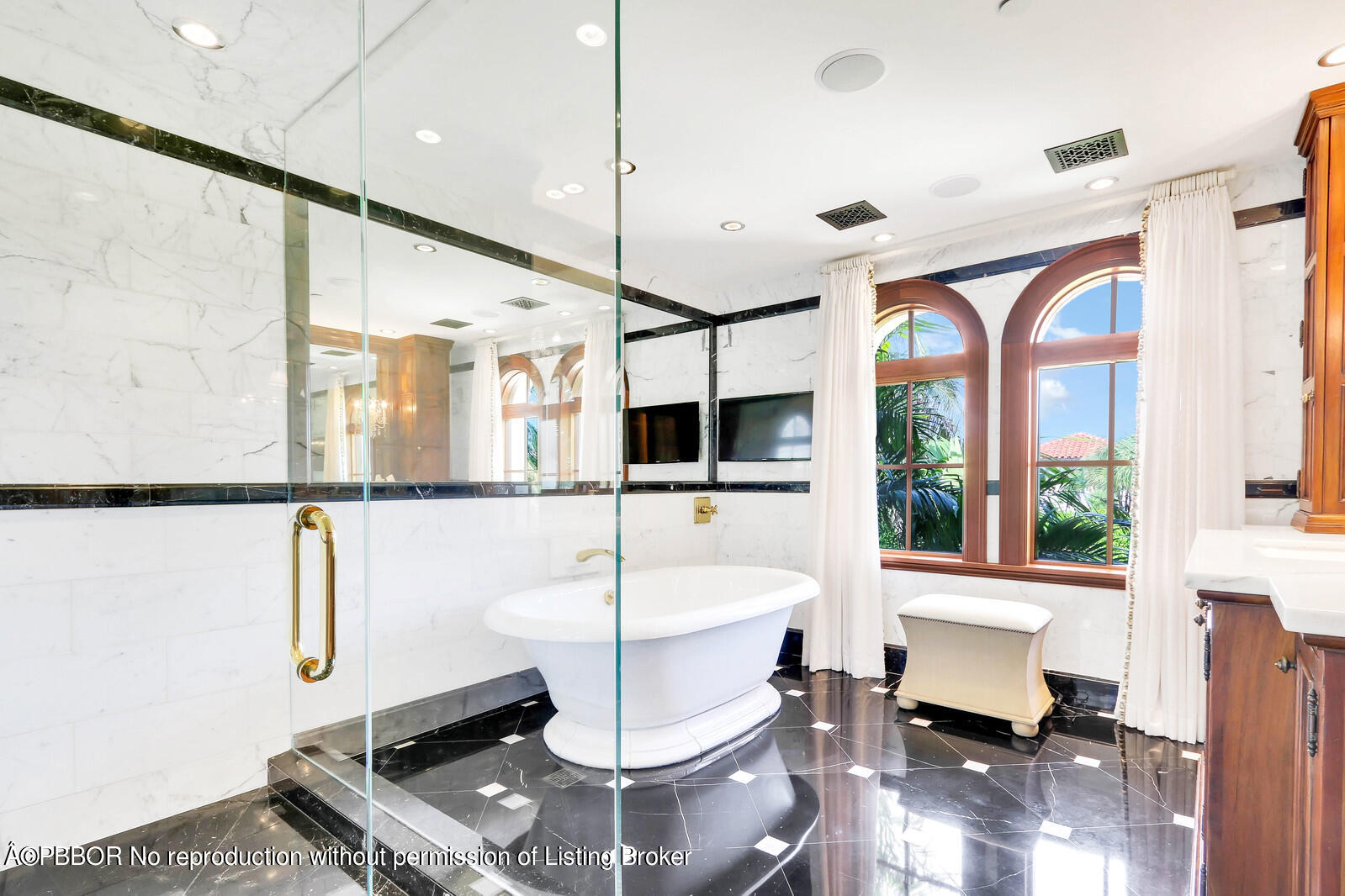 120 Jungle Road Palm Beach, FL 33480 - Photo 14 of 21 a living room with a large window and chairs