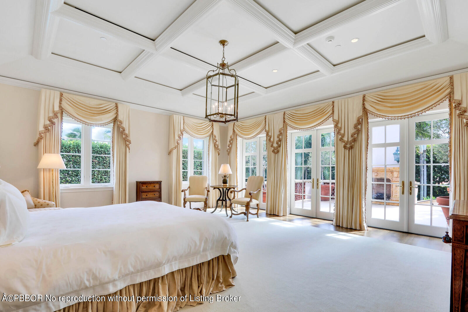 120 Jungle Road Palm Beach, FL 33480 - Photo 15 of 21 a bed sitting in a spacious bedroom next to a large window