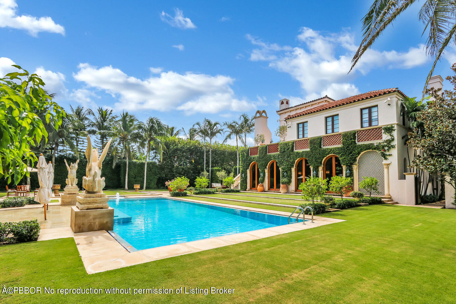 120 Jungle Road Palm Beach, FL 33480 - Photo 21 of 21 a view of a house with swimming pool and sitting area