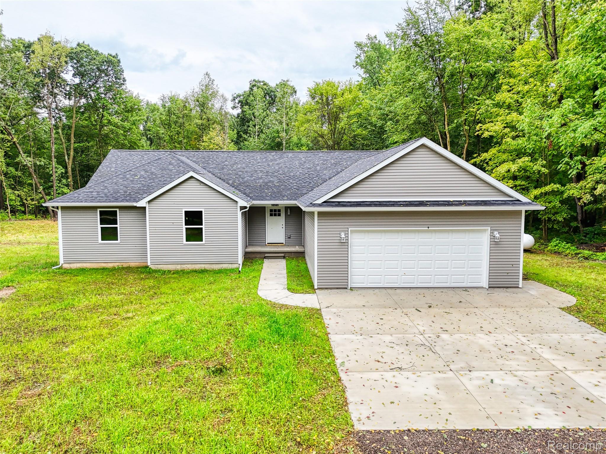 10565 West Allen Road Fowlerville, MI 48836 - Photo 1 of 31 DJI_20260904045916_0640_D_40.jpg