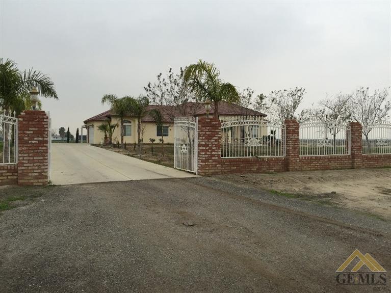 front view of a house with a street