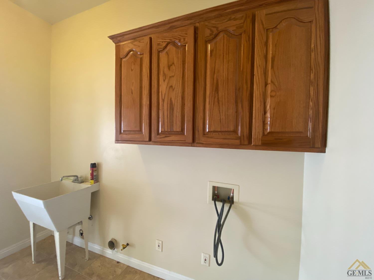 Undisclosed Address Bakersfield, CA 93307 - Photo 20 of 36 a bathroom with a bathtub and a shower