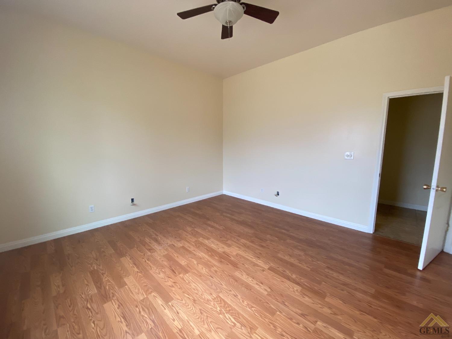 Undisclosed Address Bakersfield, CA 93307 - Photo 22 of 36 wooden floor in an empty room