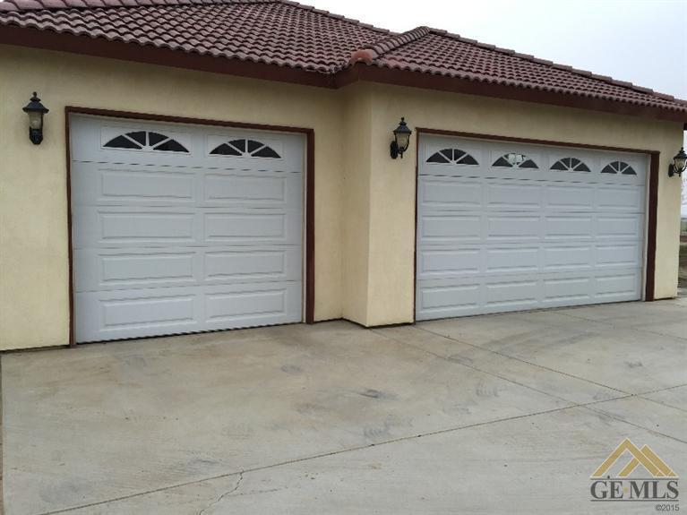 Undisclosed Address Bakersfield, CA 93307 - Photo 26 of 36 a view of garage with a white door