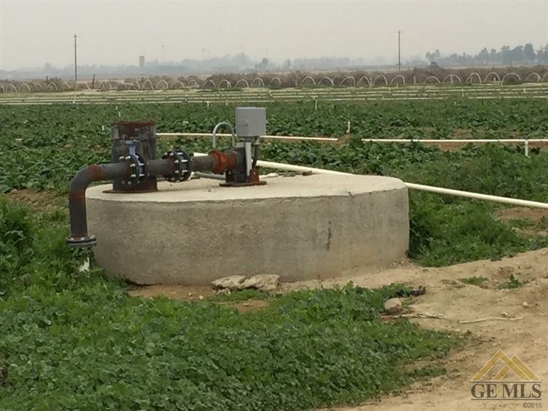 Undisclosed Address Bakersfield, CA 93307 - Photo 33 of 36 a view of a lake with a big yard