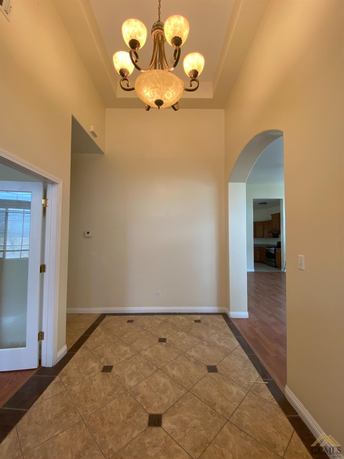Undisclosed Address Bakersfield, CA 93307 - Photo 5 of 36 a view of a livingroom with wooden floor