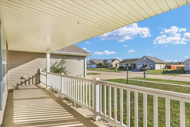 a view of a houses with a small yard