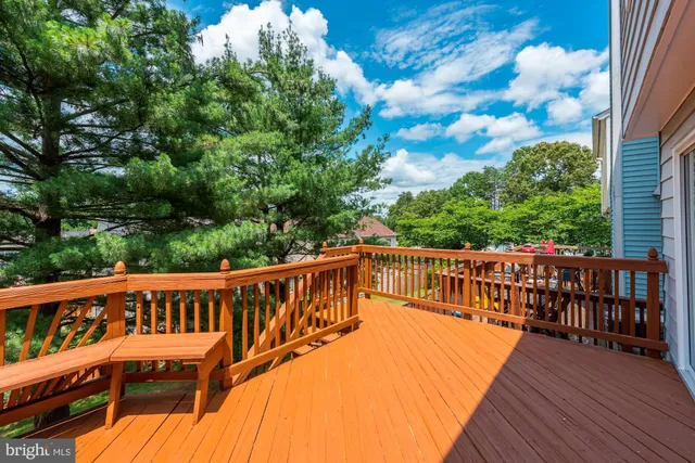 a view of a two chairs in the balcony
