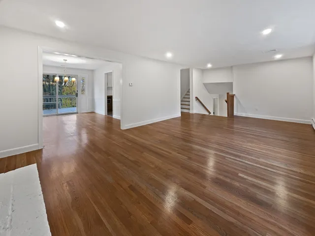 a kitchen with stainless steel appliances granite countertop a sink and cabinets