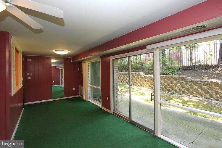 9282 Adelphi Road, Unit 102 Hyattsville, MD 20783 - Photo 2 of 29 a view of an empty room and window
