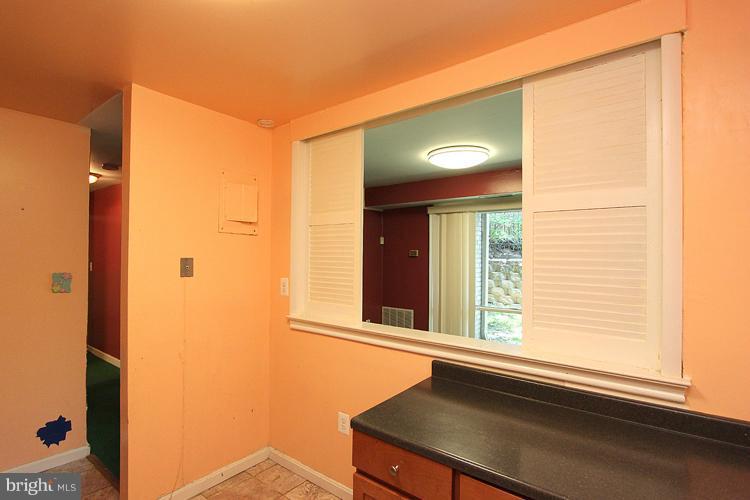9282 Adelphi Road, Unit 102 Hyattsville, MD 20783 - Photo 12 of 29 a view of a room that has a window in it