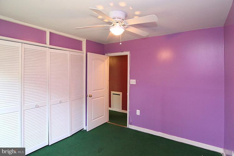 9282 Adelphi Road, Unit 102 Hyattsville, MD 20783 - Photo 13 of 29 a view of an empty room with a window