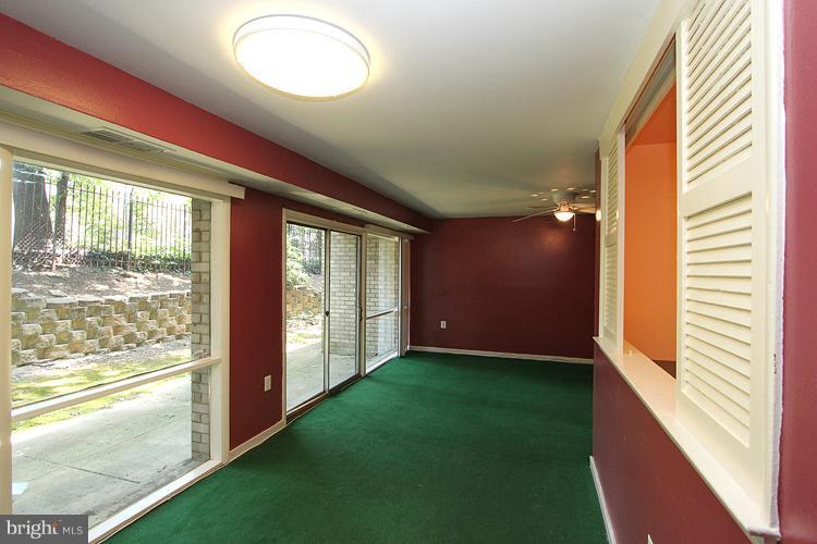 9282 Adelphi Road, Unit 102 Hyattsville, MD 20783 - Photo 17 of 29 a view of an empty room and window