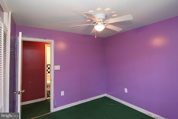 9282 Adelphi Road, Unit 102 Hyattsville, MD 20783 - Photo 25 of 29 a view of a livingroom with a workspace