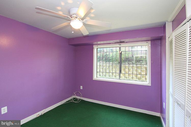 9282 Adelphi Road, Unit 102 Hyattsville, MD 20783 - Photo 26 of 29 a very nice looking room with a large window