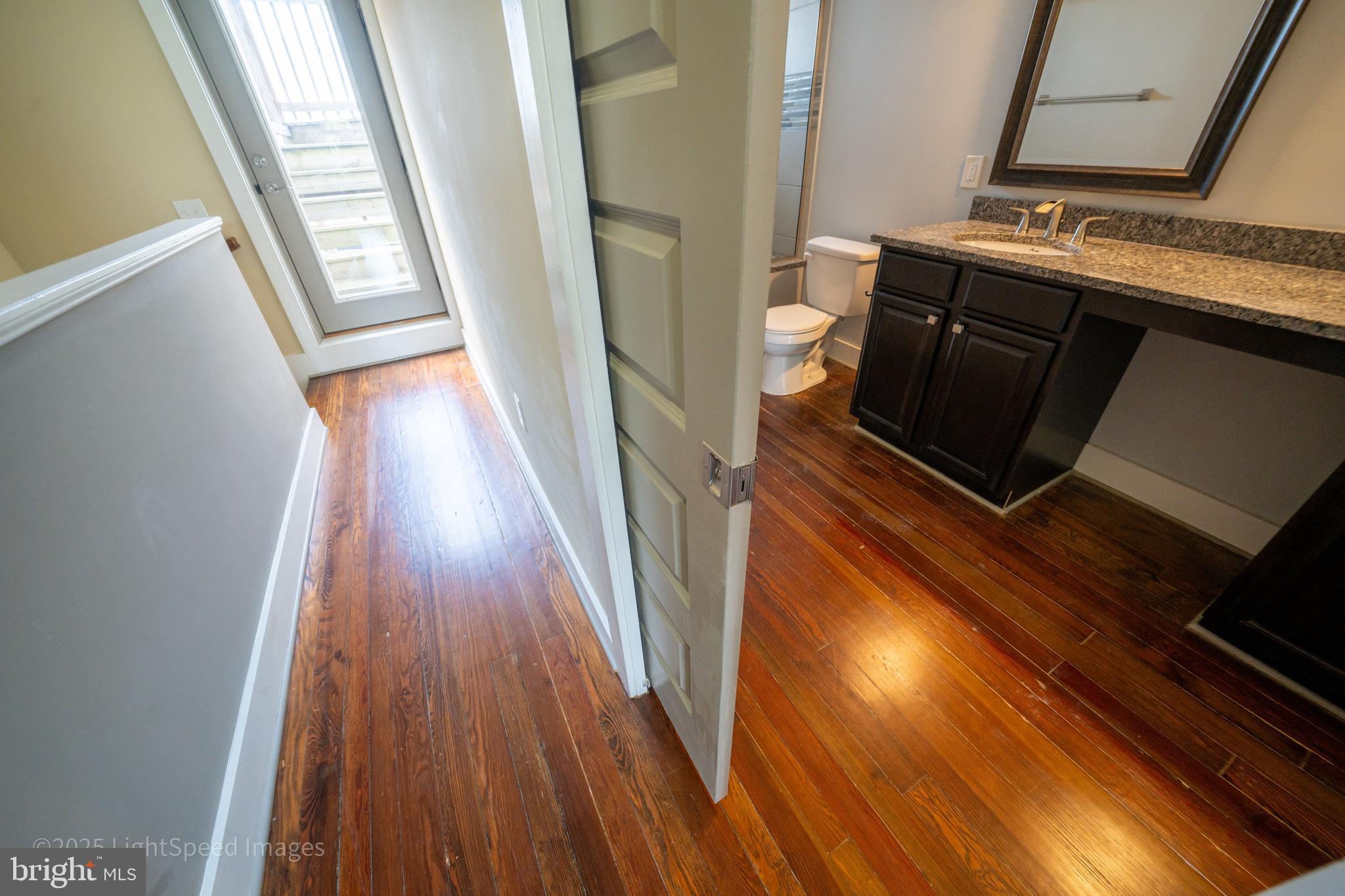2730 East Baltimore Street Baltimore, MD 21224 - Photo 17 of 40 a view of wooden floor in a kitchen