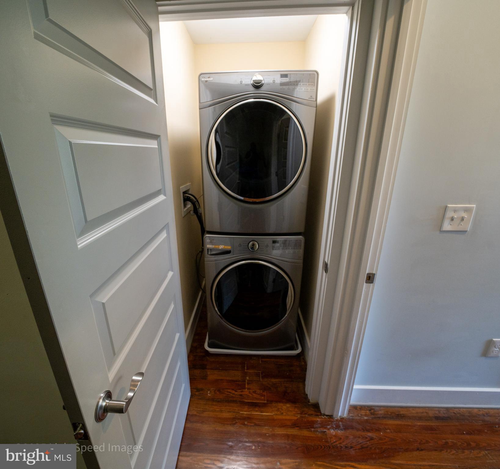 2730 East Baltimore Street Baltimore, MD 21224 - Photo 25 of 40 a view of a hallway with washer and dryer