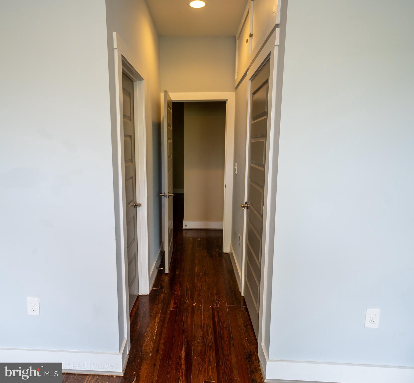 2730 East Baltimore Street Baltimore, MD 21224 - Photo 27 of 40 a view of a hallway with wooden floor