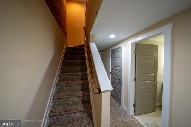 a view of hallway with stairs