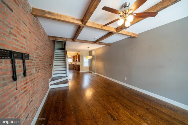 a view of a hallway with windows