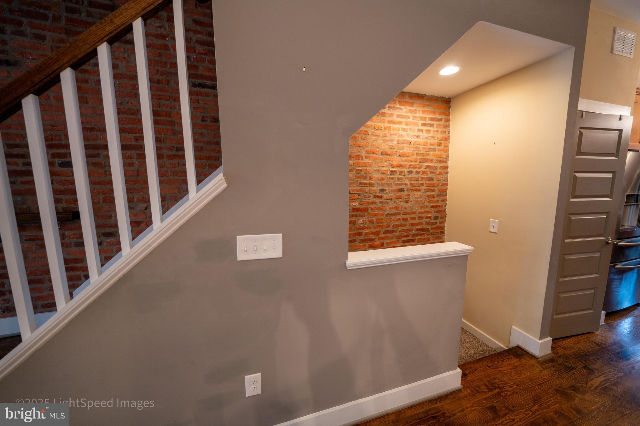 2730 East Baltimore Street Baltimore, MD 21224 - Photo 9 of 40 a view of a hallway with windows