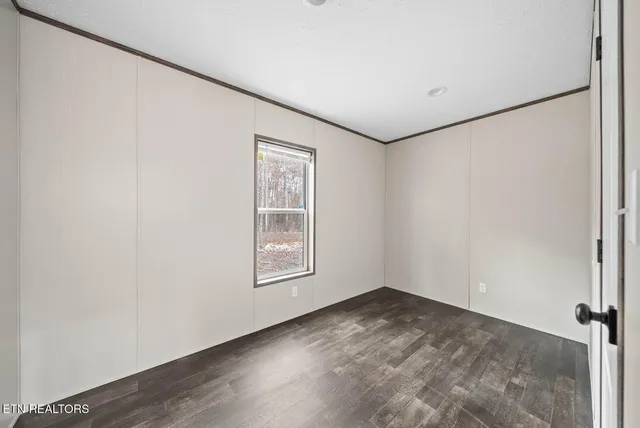 an empty room with windows