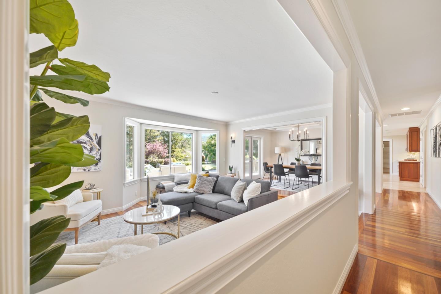 15 Debes Ranch Road San Rafael, CA 94903 - Photo 14 of 45 a view of a dining room with furniture a potted plant and a floor to ceiling window