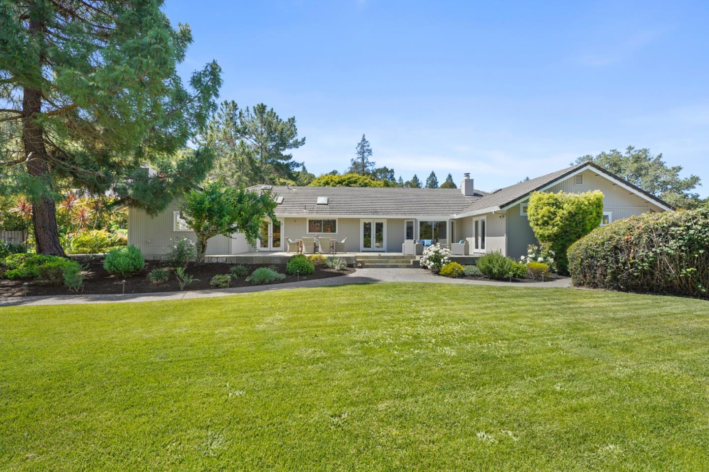 15 Debes Ranch Road San Rafael, CA 94903 - Photo 42 of 45 a front view of a house with a garden
