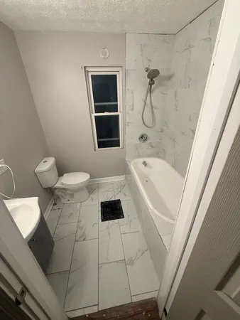 a bathroom with a bathtub