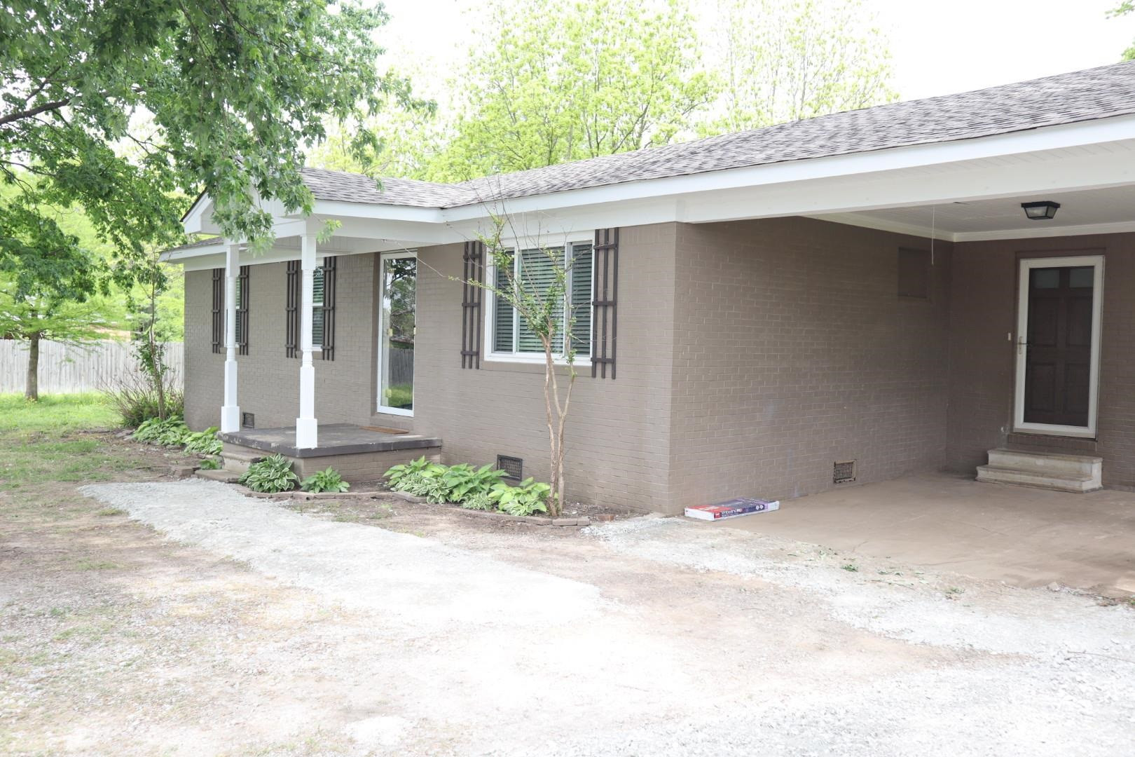 a view of house with a outdoor space