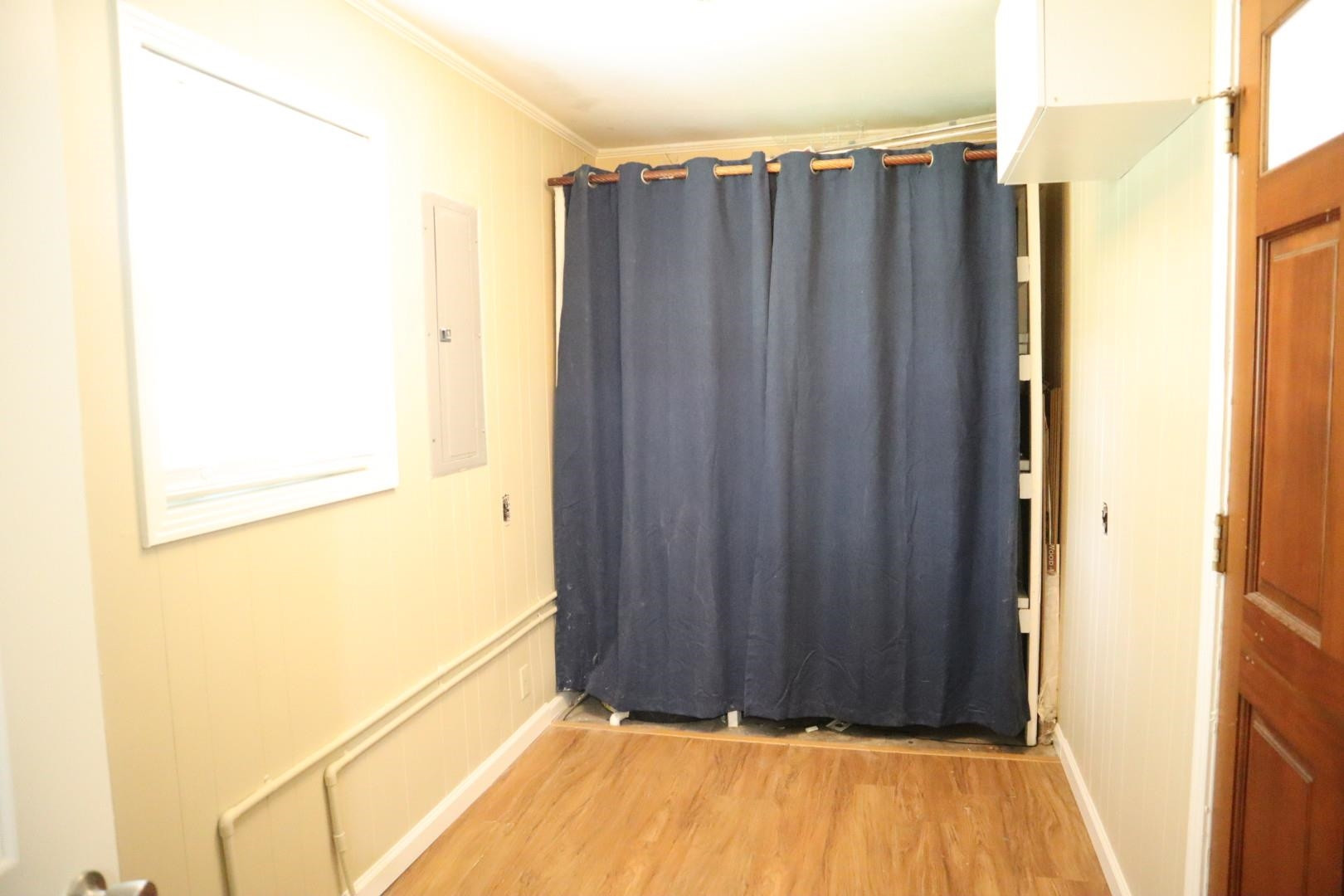 1801 Bailey Road Gadsden, TN 38337 - Photo 8 of 15 a view of a walk in closet with wooden floor