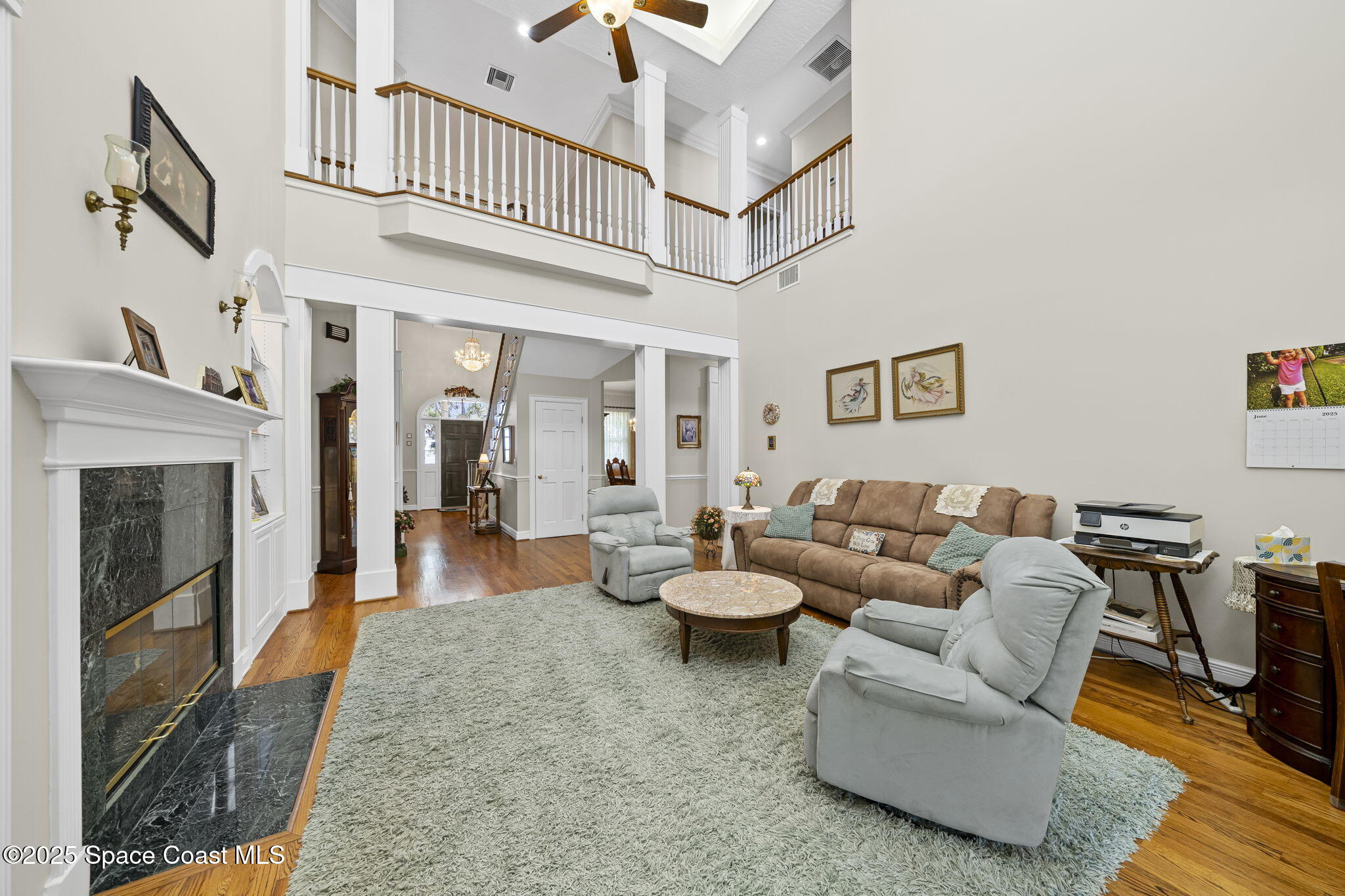 1407 Rockledge Drive Rockledge, FL 32955 - Photo 18 of 79 a living room with furniture and a fireplace