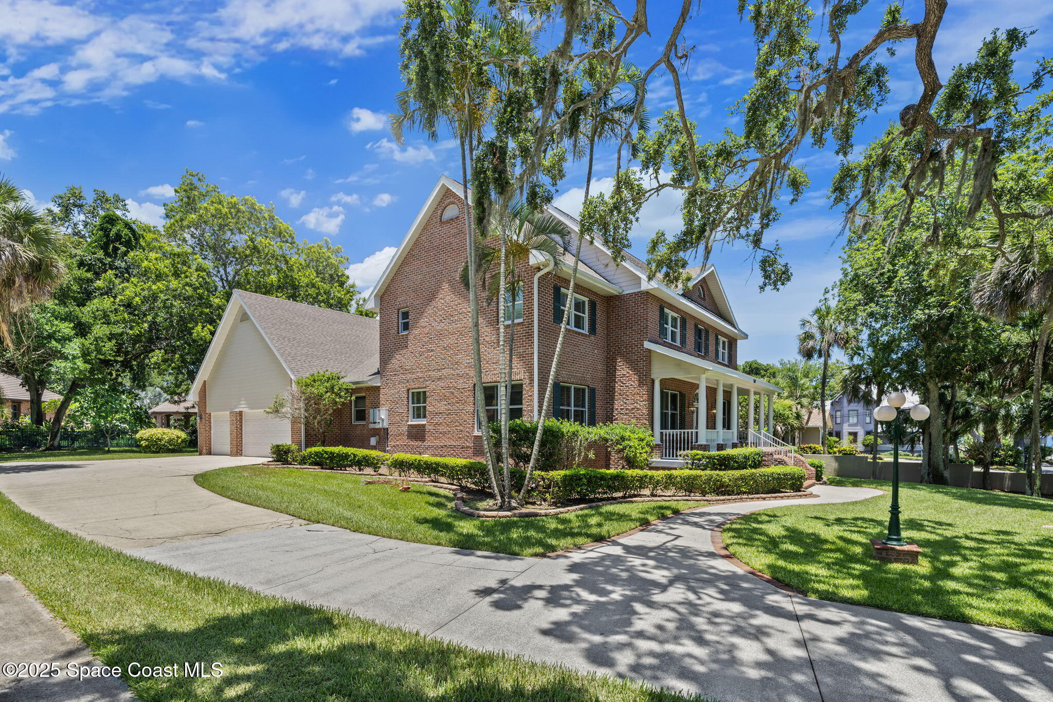 1407 Rockledge Drive Rockledge, FL 32955 - Photo 24 of 79 a front view of a house with a yard