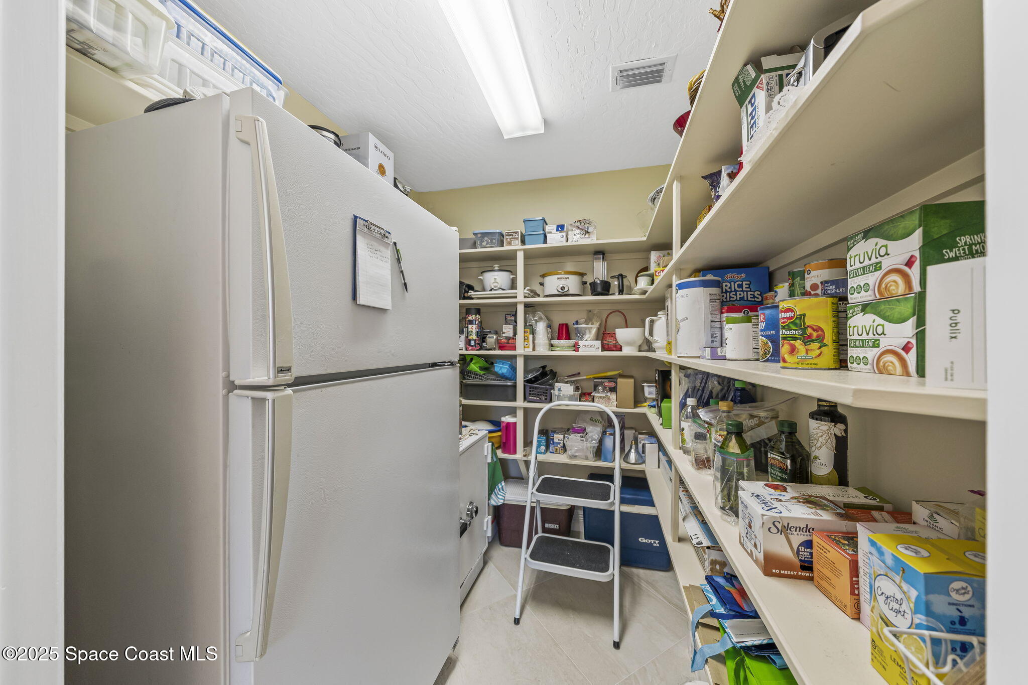 1407 Rockledge Drive Rockledge, FL 32955 - Photo 50 of 79 a view of storage and utility room