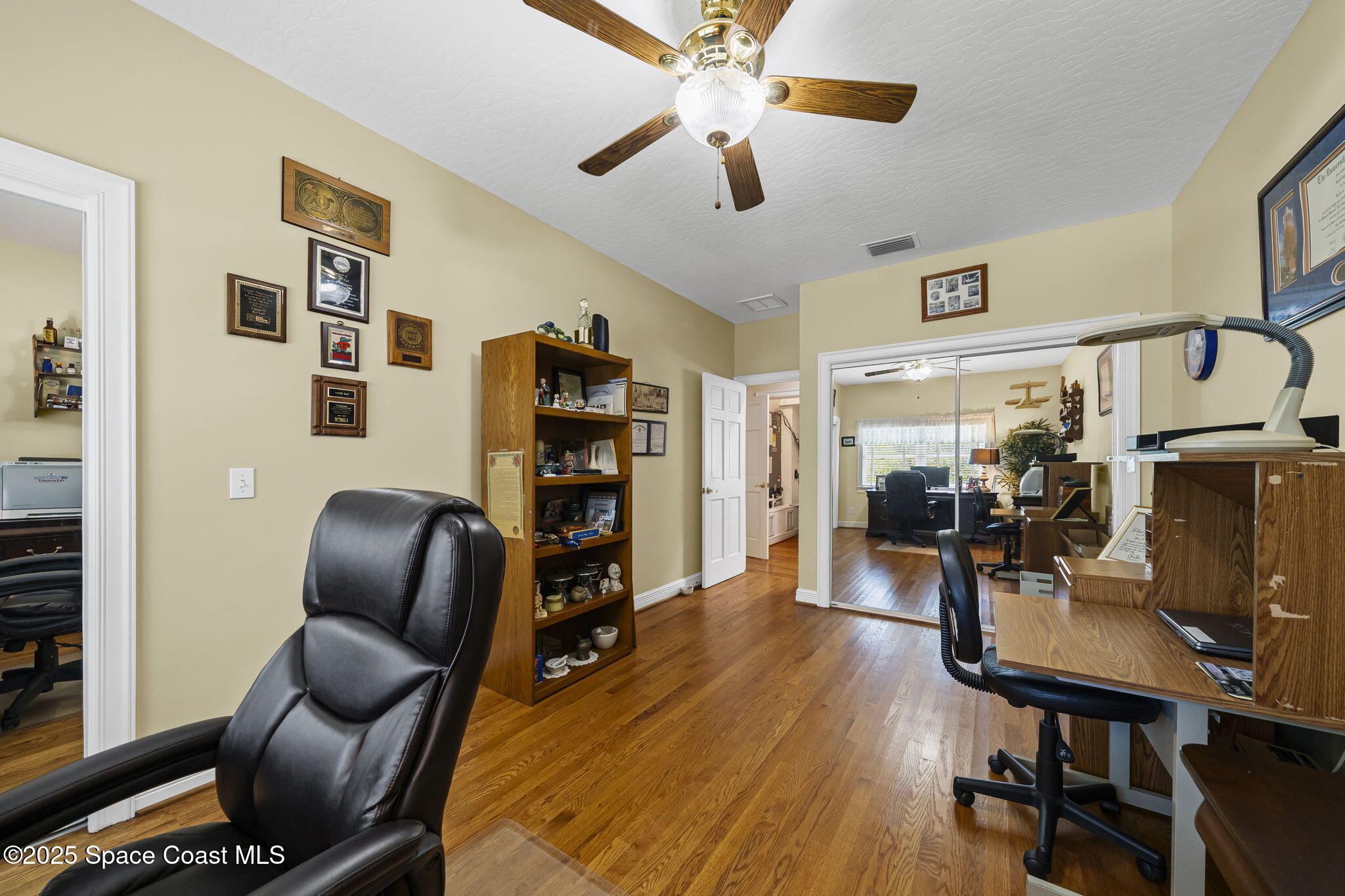 1407 Rockledge Drive Rockledge, FL 32955 - Photo 55 of 79 a view of a livingroom with workspace and a couch