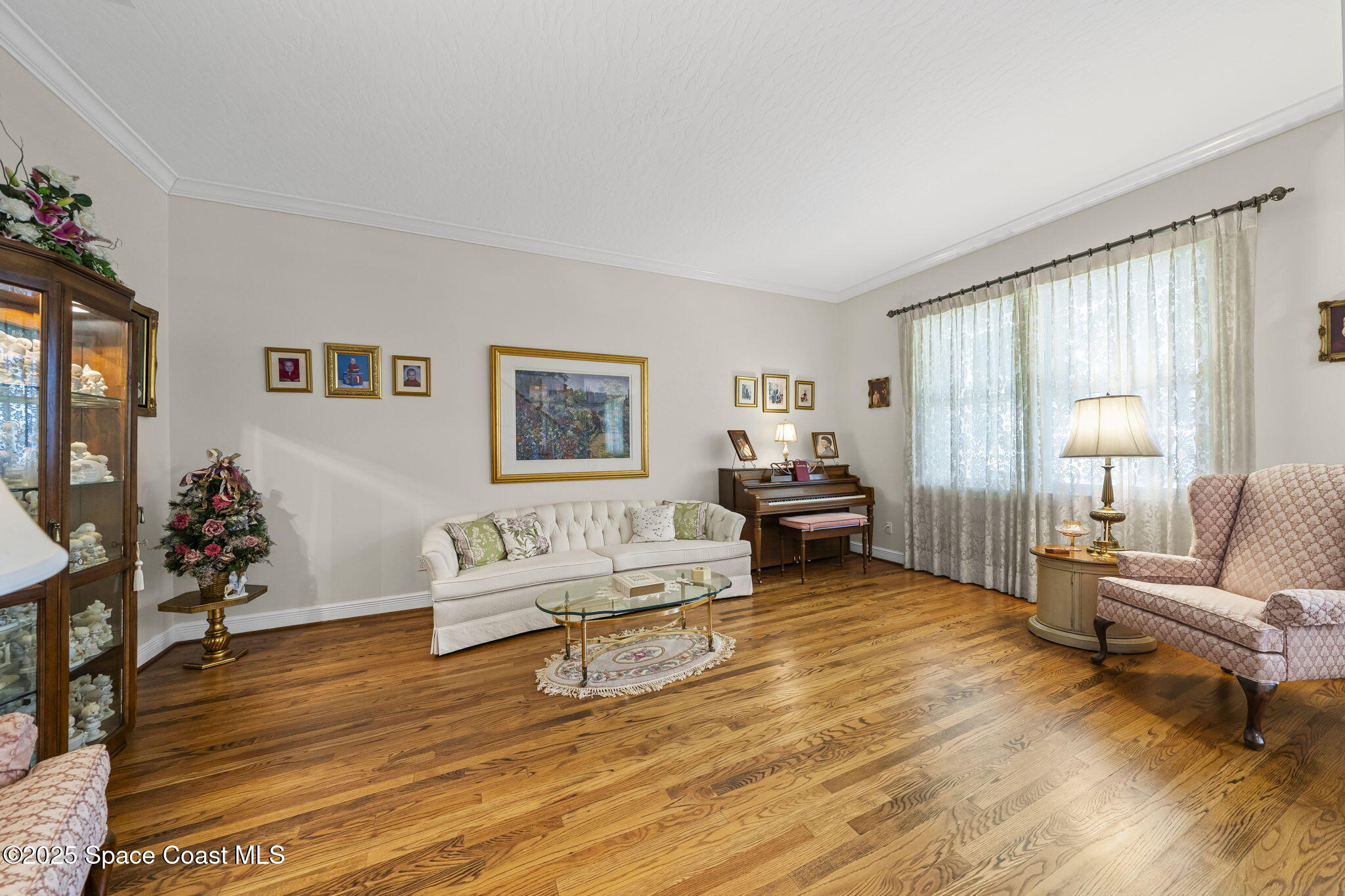 1407 Rockledge Drive Rockledge, FL 32955 - Photo 70 of 79 a living room with furniture and a wooden floor