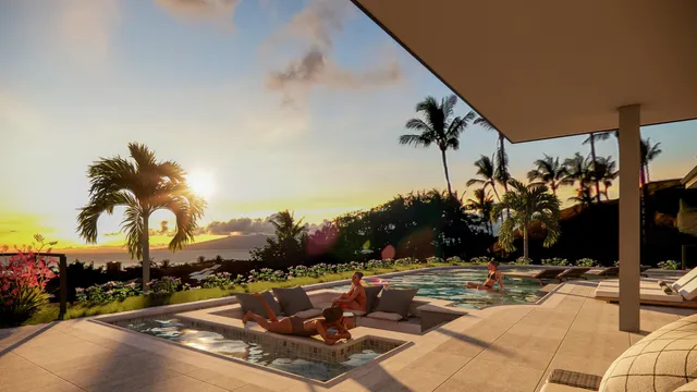 a view of a swimming pool with a patio and a fire pit